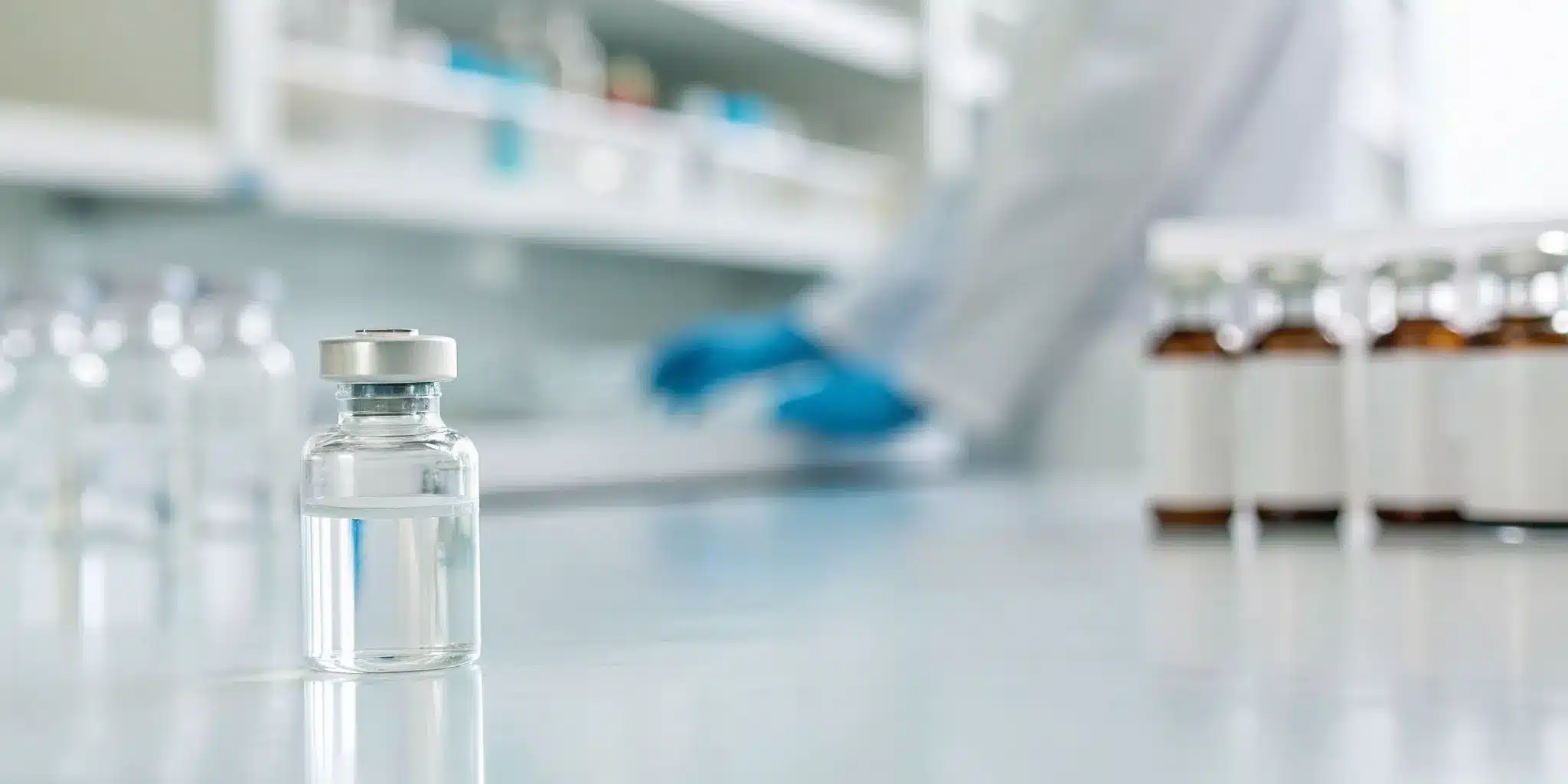 Medication vial with lot number and expiration date for pharmaceutical tracking.