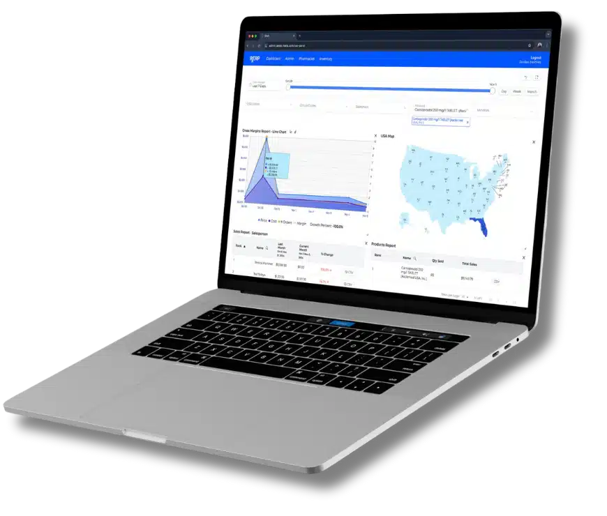 Silver laptop angled on a desk with a dashboard on the screen, showing charts and a US map visualization